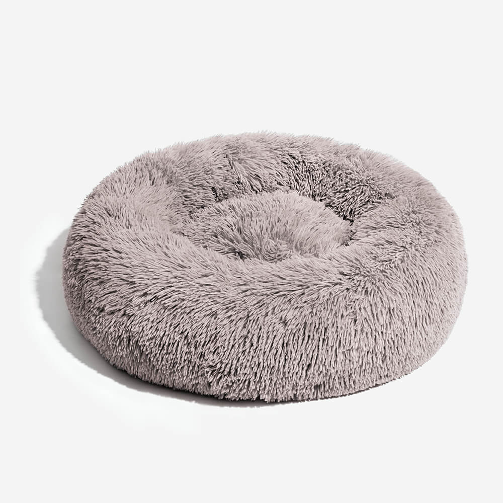 Unscharfer Runder Flauschiger Hundebett