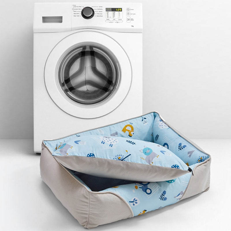 Weiches Hundebett mit Nackenschutz und Cartoon-Muster