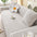 Elegante Fischgrät-Creme Ästhetik Elastischer Magic Sofaüberzug