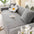 Elegante Fischgrät-Creme Ästhetik Elastischer Magic Sofaüberzug
